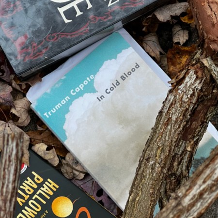 The books In Cold Blood, Hallowe'en Party, and the Complete Tales of Edgar Allan Poe.